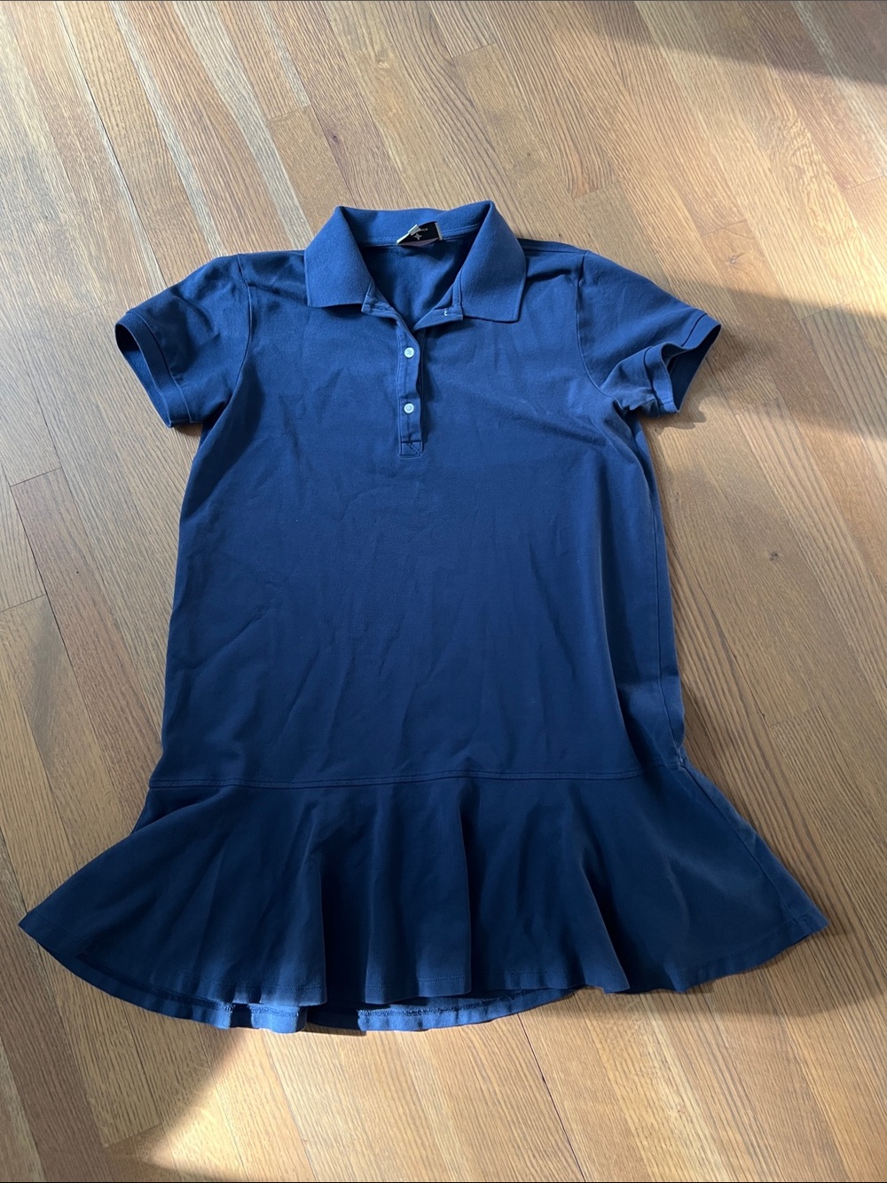 Tuckernuck Navy Polo Peplum Short Sleeve Top